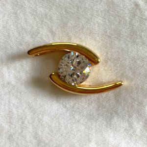 Gold Colored Necklace Pendant With Embedded Jewel